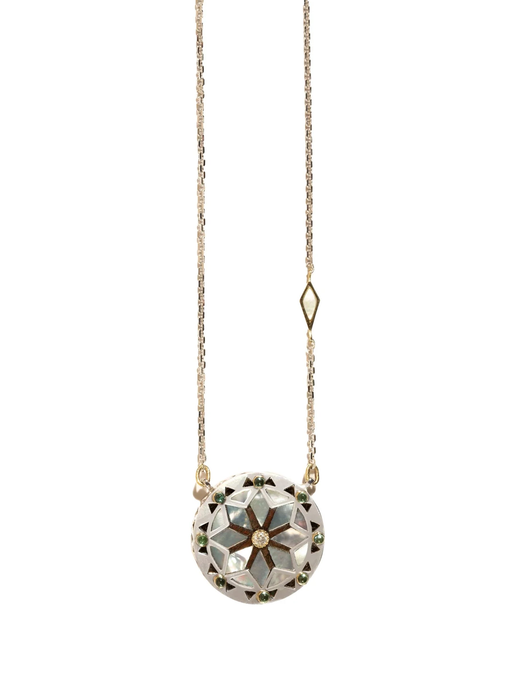 Mavia pearl necklace in gold and sterling silver with diamonds, tourmaline, and wood inlay on white background