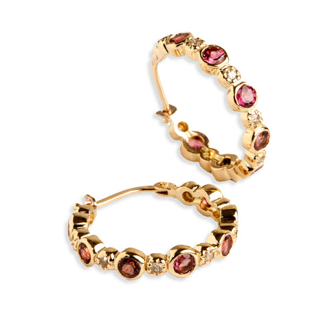 18k gold pink tourmaline and diamond hoop earrings, close up on white background