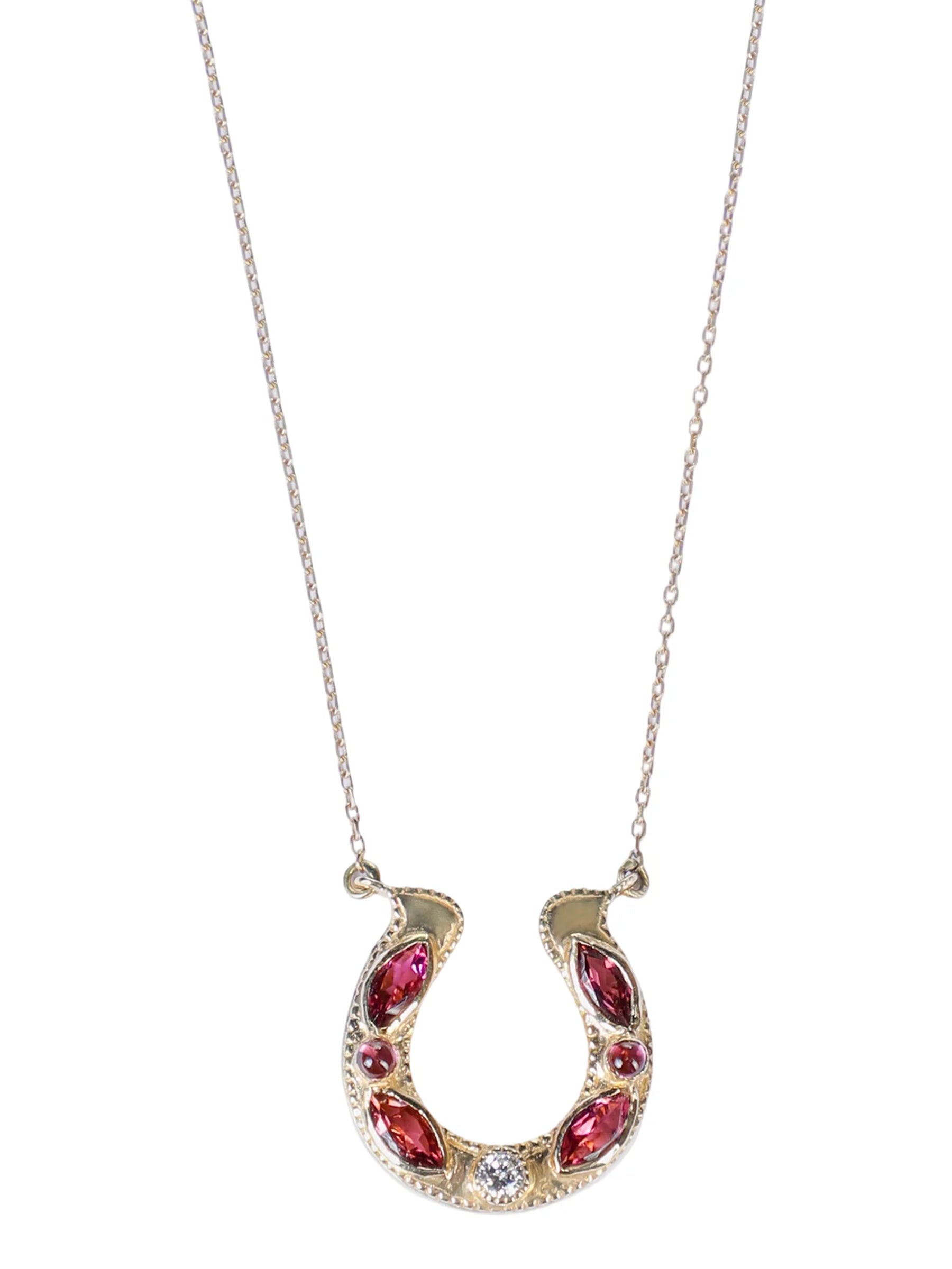 Horseshoe Pendant Necklace in 18k Gold with Pink Marquise-Cut Tourmaline Stones and diamond on a white background 