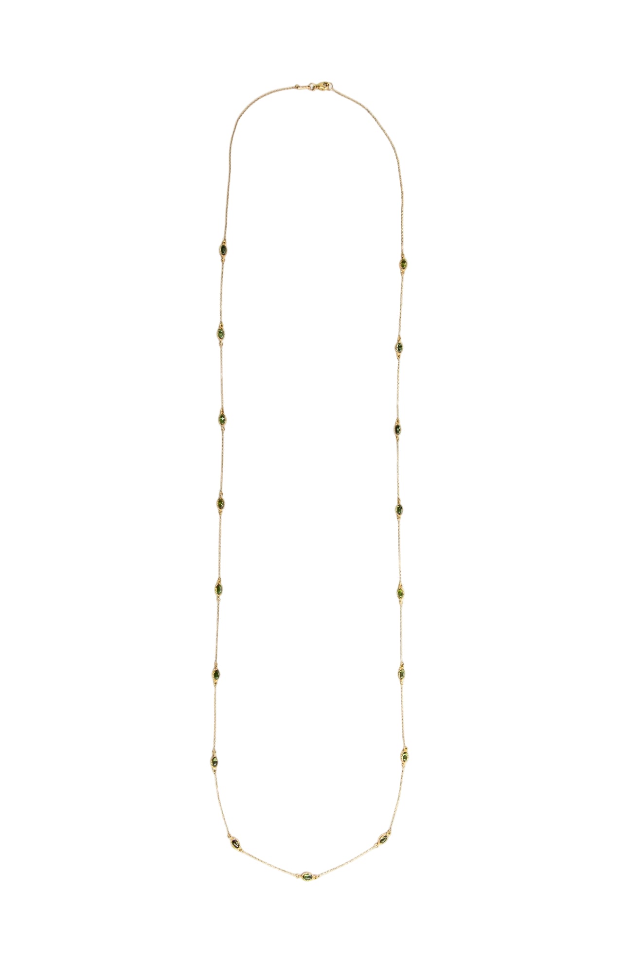 Gold long green tourmaline oval cabochon necklace on a white background