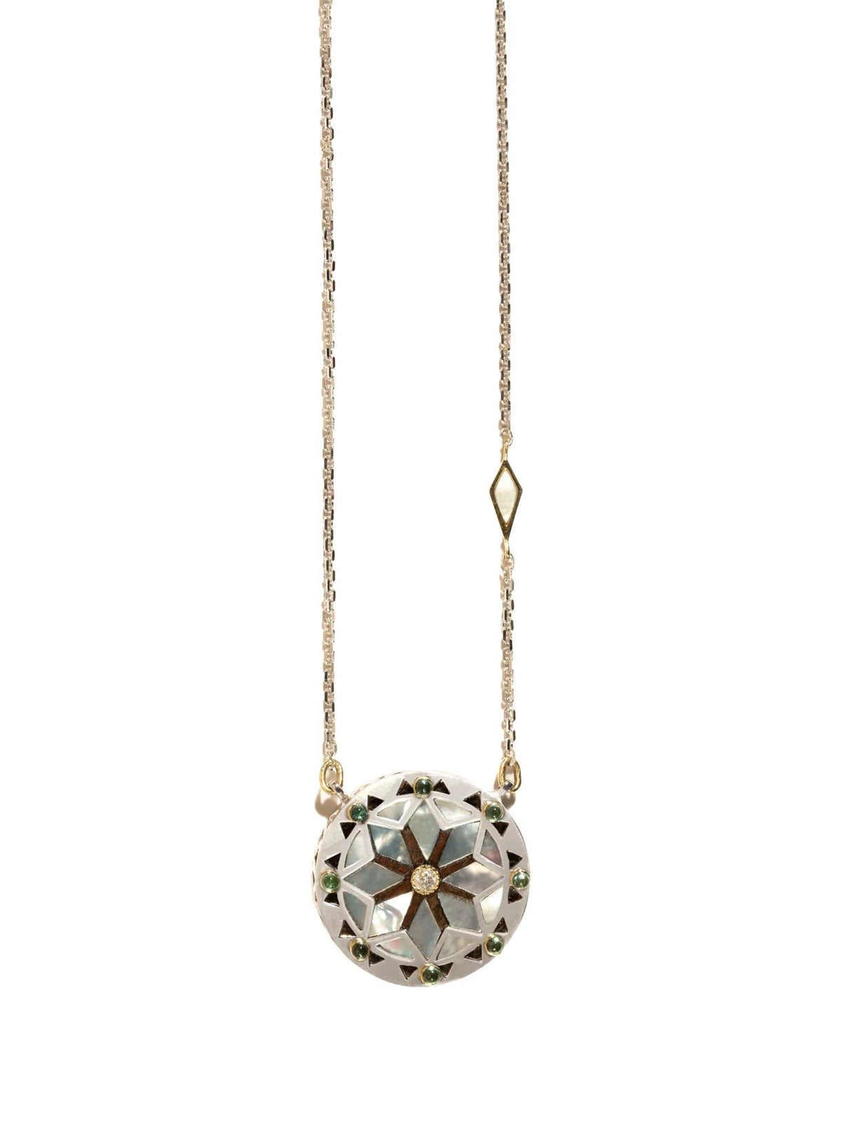 Mavia pearl necklace in gold and sterling silver with diamonds, tourmaline, and wood inlay on white background