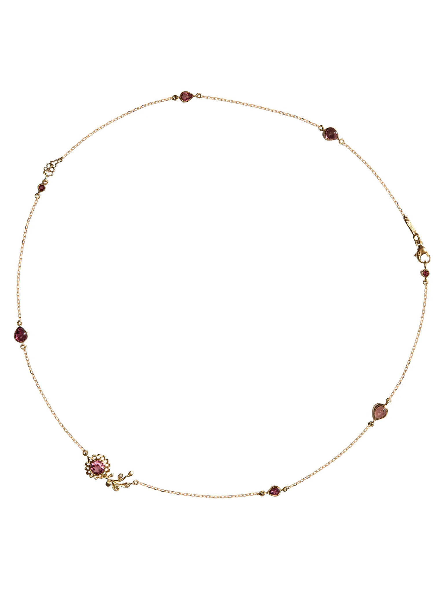 close up 18k gold liliy viens aghabani necklace set in pink tourmaline and diamonds on white back ground 