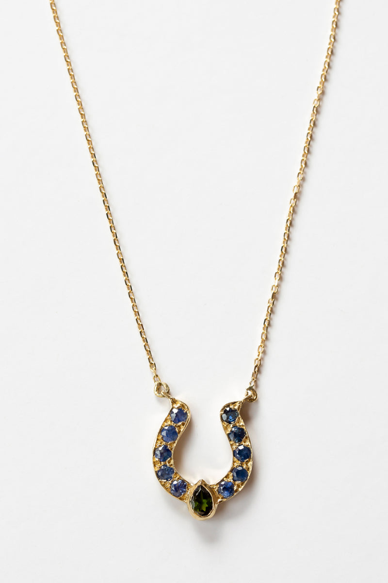 Horseshoe Necklace with Blue Sapphire and Cabochon Accent